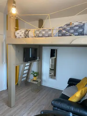 Télévision ou salle de divertissement dans l'établissement Studio cocoon