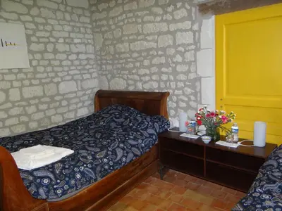 Un ou plusieurs lits dans un hébergement de l'établissement gîte du manoir des roches