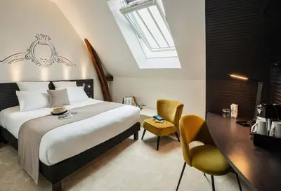 Un ou plusieurs lits dans un hébergement de l'établissement Best Western Premier Hotel de la Cite Royale