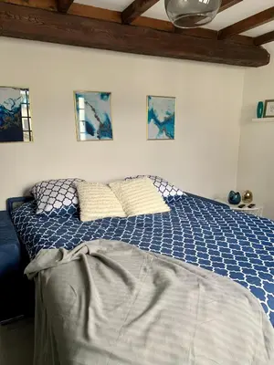Un ou plusieurs lits dans un hébergement de l'établissement Appartement les Bleuets - Centre ville de Saumur