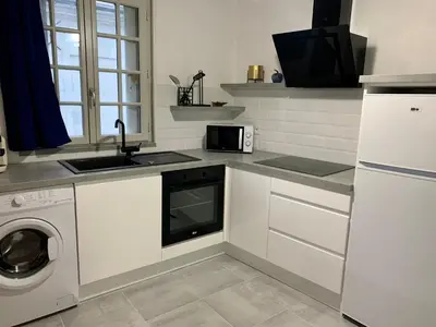 Cuisine ou kitchenette dans l'établissement Appartement les Bleuets - Centre ville de Saumur