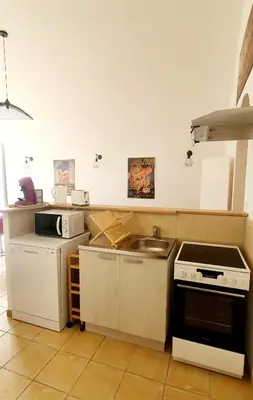 Cuisine ou kitchenette dans l'établissement Appartement 