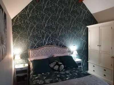 Un ou plusieurs lits dans un hébergement de l'établissement Le clos des augers. Chambre Descartes