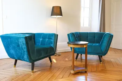 Coin salon dans l'établissement DEMEURE DES CORDELIERS avec parking privé