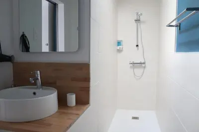 Salle de bains dans l'établissement Le Studio de Sophie
