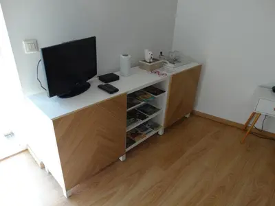 Télévision ou salle de divertissement dans l'établissement Aux Champs Des Châteaux