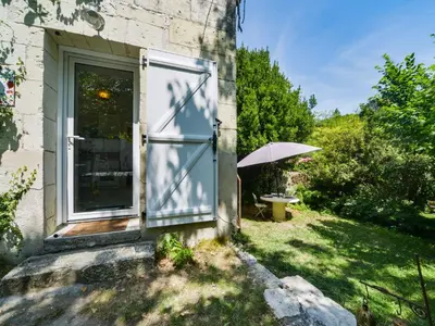 Jardin de l'établissement Holiday Home La petite maison blanche by Interhome
