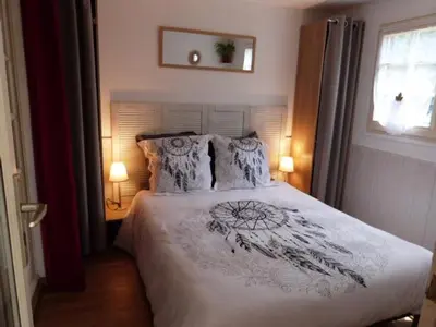 Un ou plusieurs lits dans un hébergement de l'établissement Gîte Les Hortensias