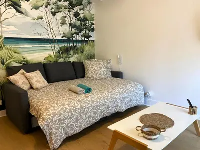 Un ou plusieurs lits dans un hébergement de l'établissement Cosy Break Jardins des plantes