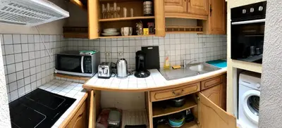 Cuisine ou kitchenette dans l'établissement Appart T2 Prefecture et Centre Ville