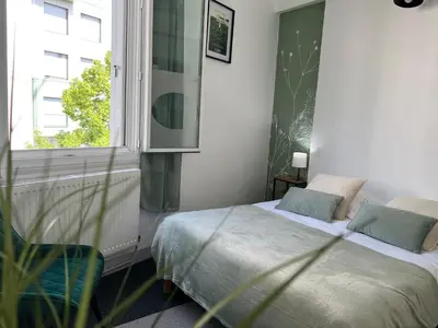 Un ou plusieurs lits dans un hébergement de l'établissement Hotel TULTY