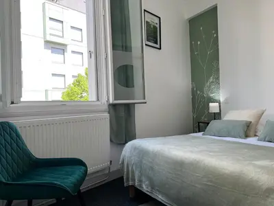 Un ou plusieurs lits dans un hébergement de l'établissement Hotel TULTY