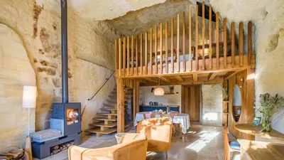 Coin salon dans l'établissement Le Clos Baudoin B&B Troglo
