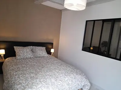 Un ou plusieurs lits dans un hébergement de l'établissement Le cosy d'Amboise