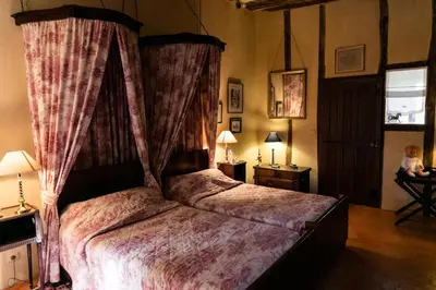 Un ou plusieurs lits dans un hébergement de l'établissement Manoir Du Bois Noblet