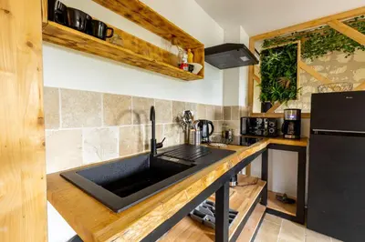 Cuisine ou kitchenette dans l'établissement MonteVerde - Domaine Tropical