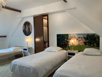 Un ou plusieurs lits dans un hébergement de l'établissement Maison familiale Blois piscine et SPA