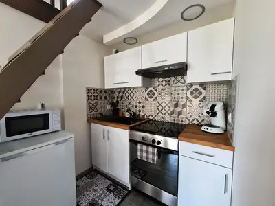 Cuisine ou kitchenette dans l'établissement Le Petit Logis