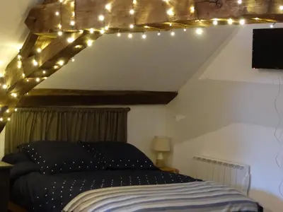 Un ou plusieurs lits dans un hébergement de l'établissement Vue splendide sur Chateau