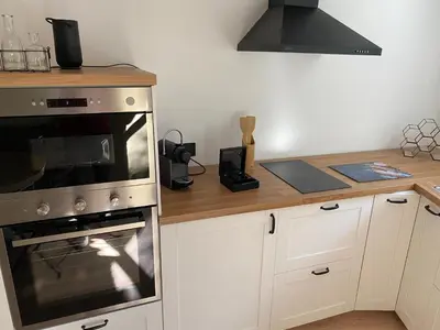 Cuisine ou kitchenette dans l'établissement Gîte Le Travezay