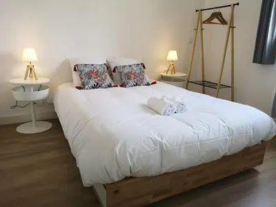 Un ou plusieurs lits dans un hébergement de l'établissement Happy Kool - centre ville + wifi + parking privé
