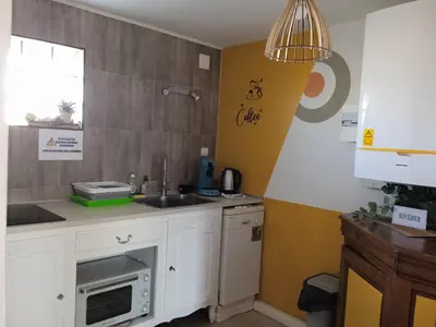 Cuisine ou kitchenette dans l'établissement Maison de vacances Sol & Piper