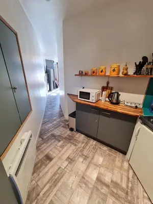 Cuisine ou kitchenette dans l'établissement À 18min du ZOO 30min des 24h du Mans