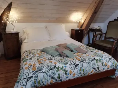Un ou plusieurs lits dans un hébergement de l'établissement Chambres d'hôtes VILLA ALEXINA