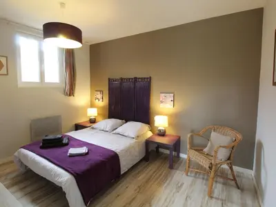 Un ou plusieurs lits dans un hébergement de l'établissement Gîte charmant 4 pers avec jardin privé, proche Saumur et bords de Loire, tout inclus - FR-1-622-5