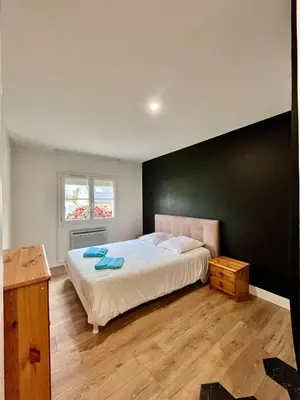 Un ou plusieurs lits dans un hébergement de l'établissement Maison 1440 - STORIES, logement Atypique Sport Auto