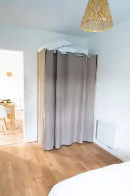 Un ou plusieurs lits dans un hébergement de l'établissement Appartement cosy avec parking privé à Saumur
