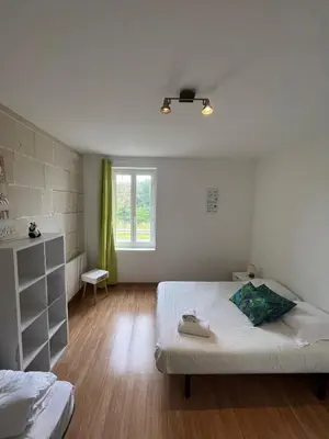 Un ou plusieurs lits dans un hébergement de l'établissement La Maison des Cochards - vue sur le Cher à 5 minutes de beauval