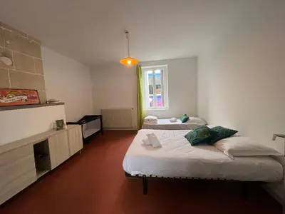 Un ou plusieurs lits dans un hébergement de l'établissement La Maison des Cochards - vue sur le Cher à 5 minutes de beauval