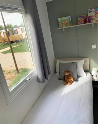 Un ou plusieurs lits dans un hébergement de l'établissement MOBILHOME 3 CH CAMPING 4*