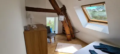 Un ou plusieurs lits dans un hébergement de l'établissement La Loge de Gabrielle - gîte - 3 étoiles