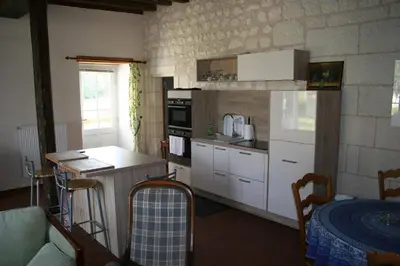 Cuisine ou kitchenette dans l'établissement Grand gite en rez-de-jardin
