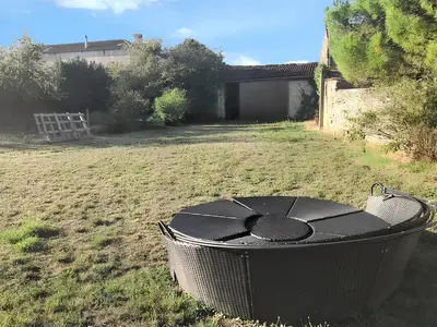 Jardin de l'établissement Charmante maison à Mouterre-Silly avec jardin et terrasse