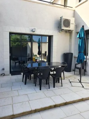 Coin salon dans l'établissement Bel appartement spacieux et confortable idéalement situé