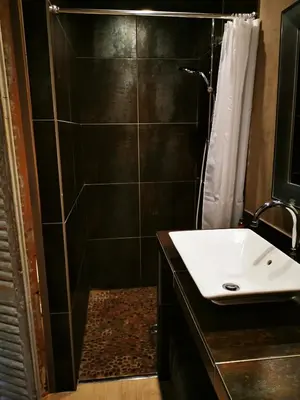 Salle de bains dans l'établissement Le Puits de la Foltière