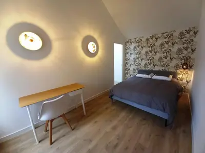 Un ou plusieurs lits dans un hébergement de l'établissement HISTOIRE DE LOIRE - La Maison