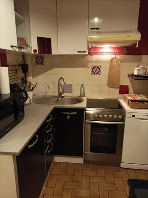Cuisine ou kitchenette dans l'établissement La Boussole - Maison meublée 3 chambres 6 pers.
