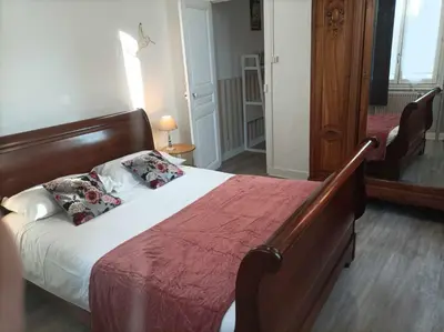 Un ou plusieurs lits dans un hébergement de l'établissement La Boussole - Maison meublée 3 chambres 6 pers.