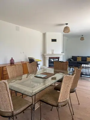 Coin salon dans l'établissement Maison des Grands Champs