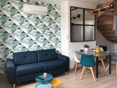 Coin salon dans l'établissement Riva Duplex