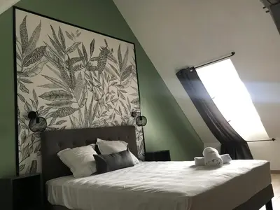 Un ou plusieurs lits dans un hébergement de l'établissement Riva Duplex