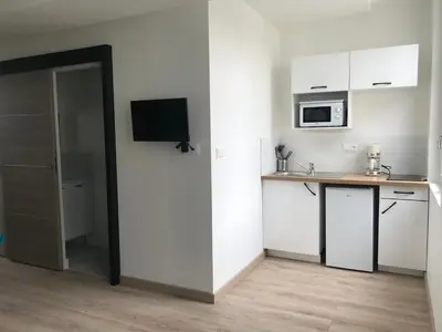 Cuisine ou kitchenette dans l'établissement Riva Duplex