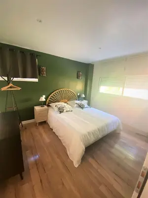 Un ou plusieurs lits dans un hébergement de l'établissement La Maison d'Elena 1,5km du Zoo,confortable et détente assurée