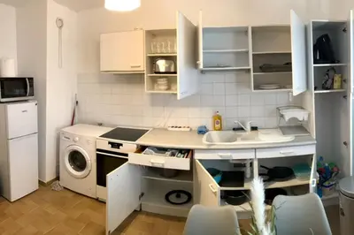 Cuisine ou kitchenette dans l'établissement Appart T2 spacieux proche Gare TGV