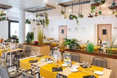 Restaurant ou autre lieu de restauration dans l'établissement Résidence Le Mans