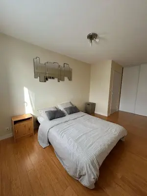 Un ou plusieurs lits dans un hébergement de l'établissement Appartement T3 proche circuit du Mans